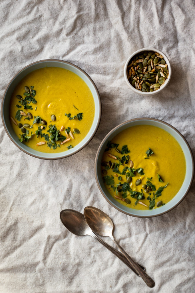 Two bowls of summer squash and chickpea bisque