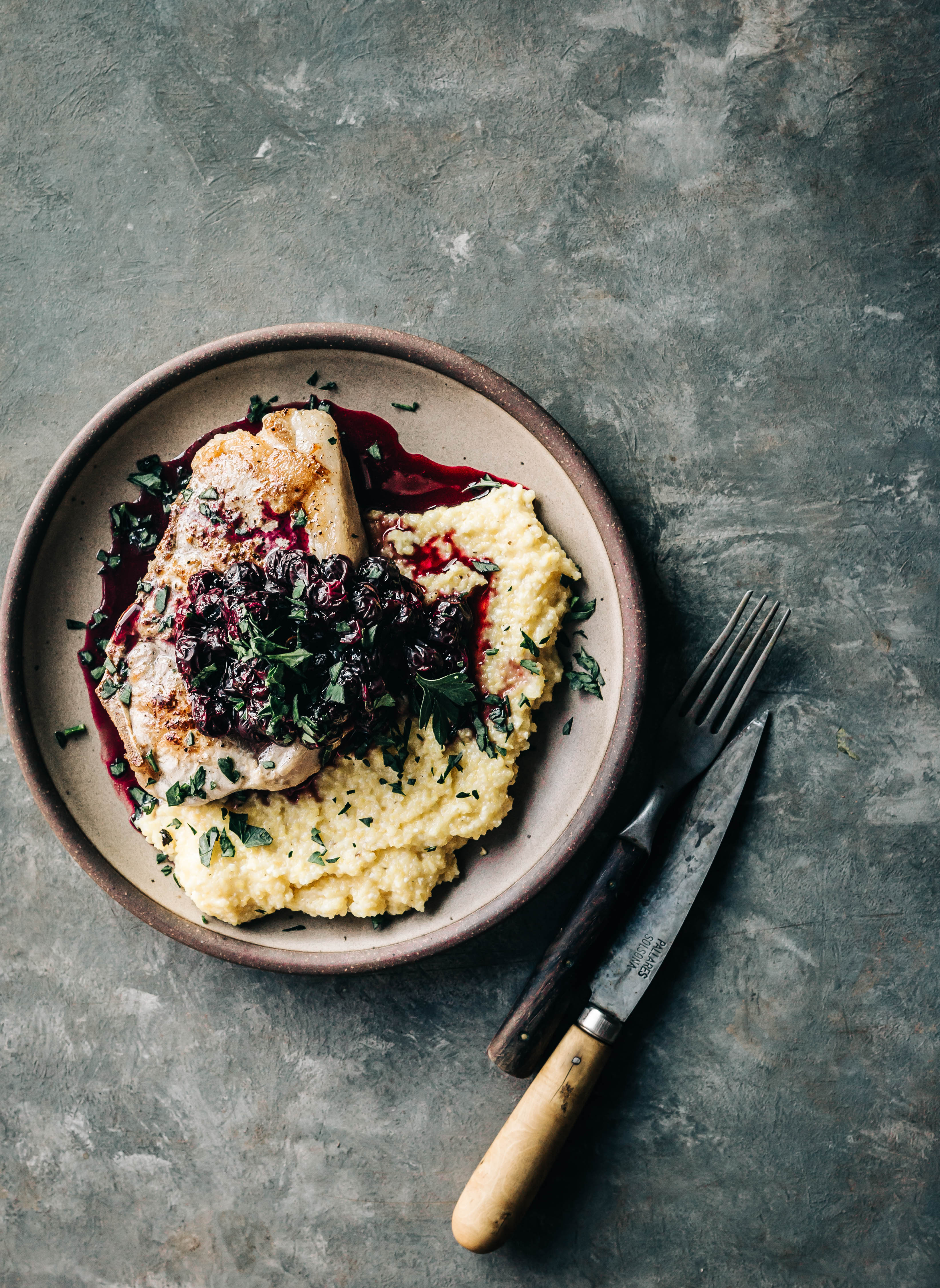 Pork Chops with Boozy Blueberry Compote & Polenta Dishing Up the Dirt