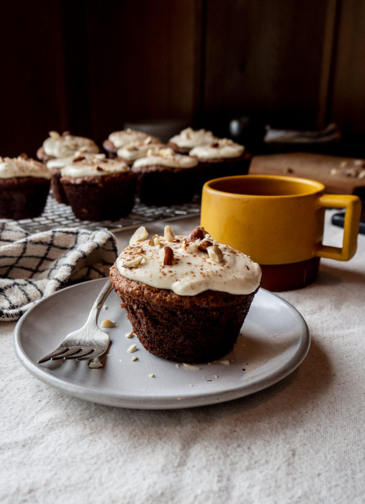 Parsnip and date muffin with honey cream cheese frosting
